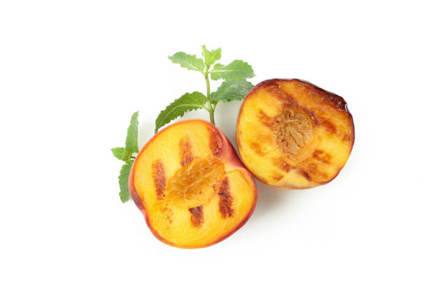 Tasty grilled peach isolated on white background