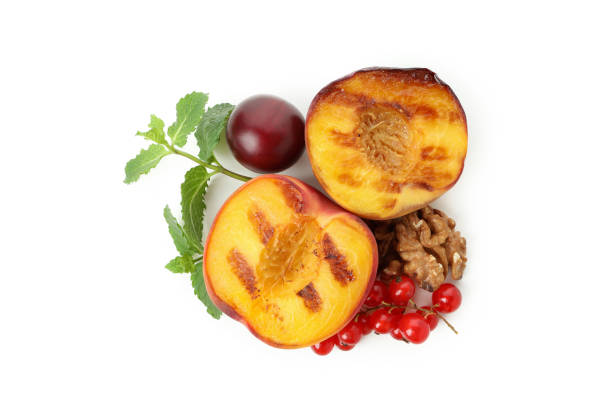 istock Tasty grilled peach isolated on white background 1471653323