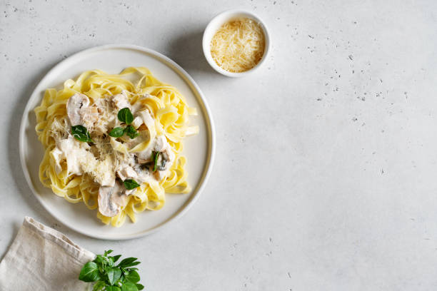 istock Pasta mushrooms with chicken, parmesa and basil 1471653555