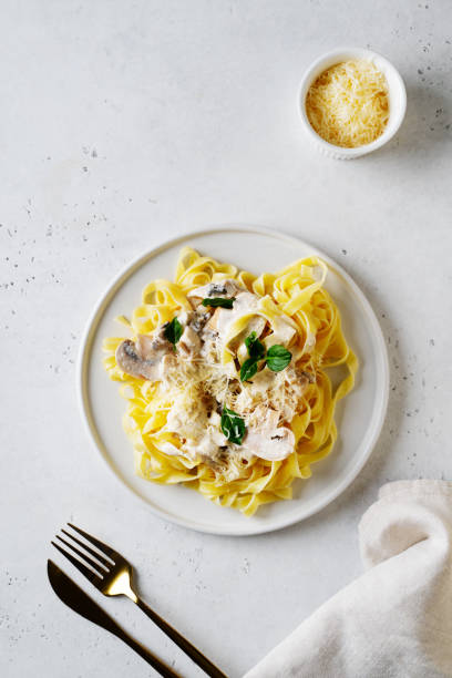 istock Pasta mushrooms with chicken, parmesa and basil 1471653564