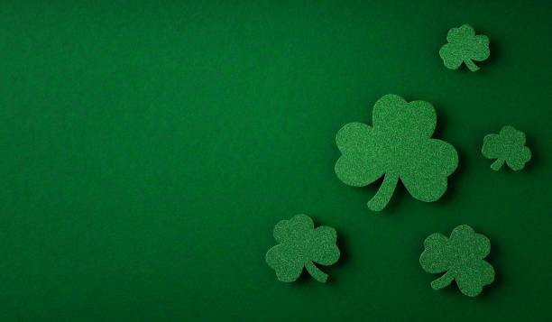 istock Saint Patrick day flat lay concept with shamrock clover on green background 1471653627