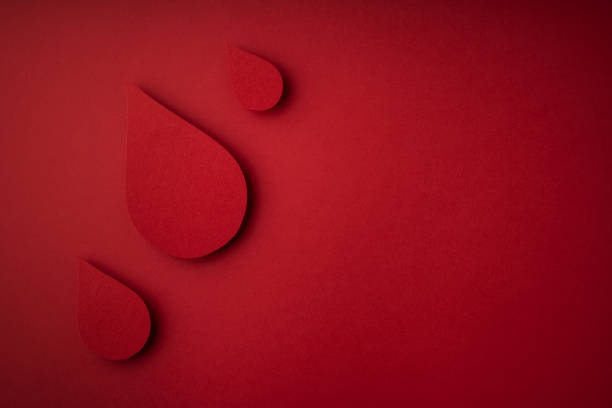 istock World donor day concept with paper red drop on white background 1471653633