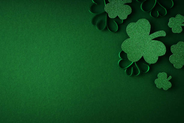 istock Saint Patrick day flat lay concept with shamrock clover on green background 1471655115