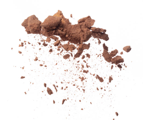 istock Cocoa powder fall fly in mid air mix cookie cracker, Cocoa powder floating explosion. Cocoa powder Chocolate chip crunch throw in air. White background isolated freeze motion high speed shutter 1471658060
