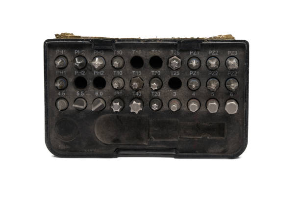 istock Old used set of screwdriver bits with parts missing, isolated on white 1471660575