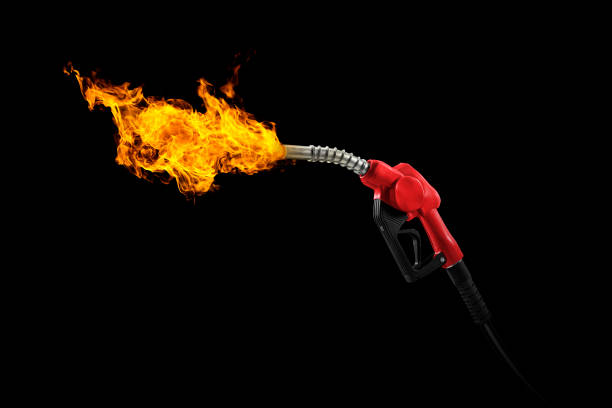 istock gasoline injector with fire on black background 1471660624
