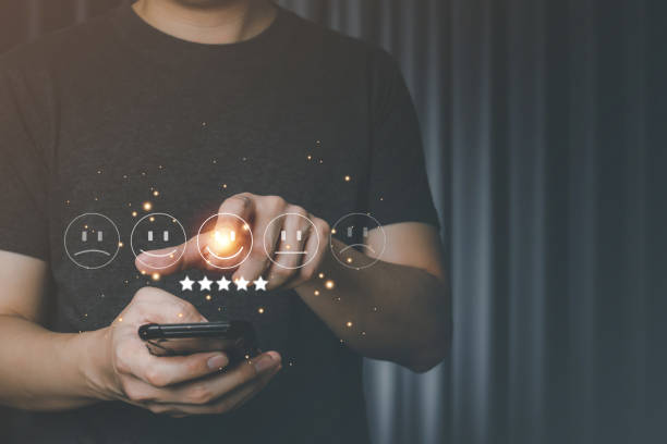 istock Business people press the smiley face emoticon on the virtual reality touch screen, Customer service evaluation concept. Review and put a check mark. That the score is very impressive. 1471660962