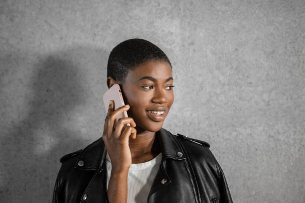 istock Black woman having phone call looking away while looking away 1471662579