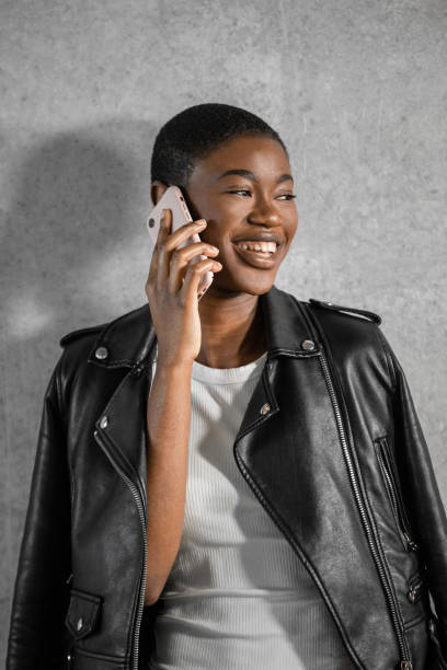 istock Black woman having phone call looking away while looking away 1471662590