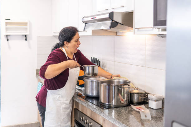 istock Woman who burns cooking in the kitchen 1471664612