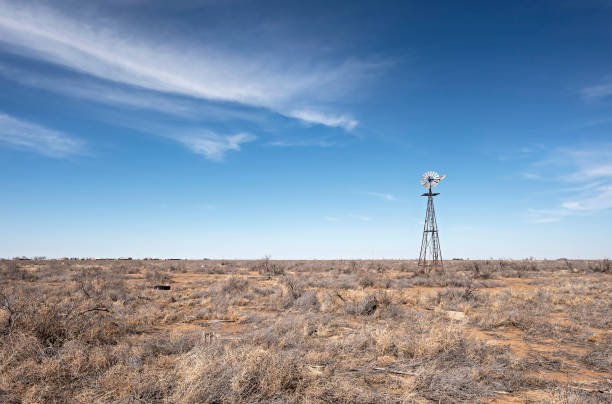 istock Lone Windmill on the Desert at Hobbs 1471666911