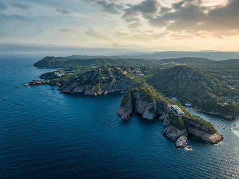 Fornells de Mar Panorama Catalonia Costa Brava Coast. Drone view to Fornells Coastal Fishing Village Harbor and small Beaches and coastal Hills. Panorama flying over the Mediterranean Spanish Costa Brava Coast, Mountain and Hill Range of Fornells.. Fornells, Begur, Costa Brava, Gerona Province, Catalonia, Spain, Southern Europe.
