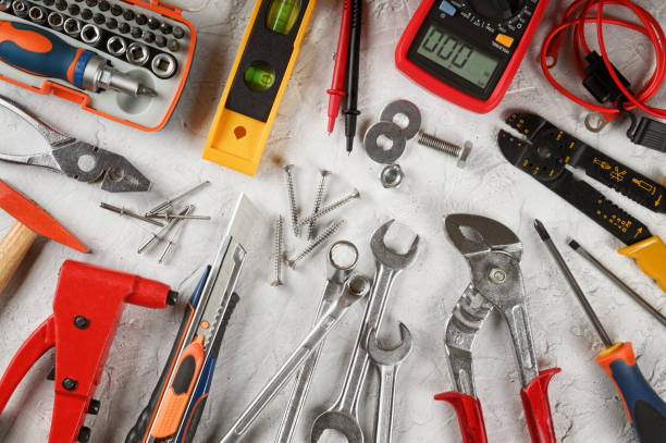 istock Set of hand tools on white plaster background, closeup. Top view, flat lay. 1471668179