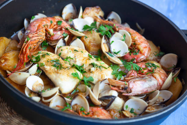 Fish and seafood stew stock photo