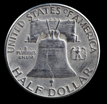 Reverse side of a silver Franklin US half dollar coin.
