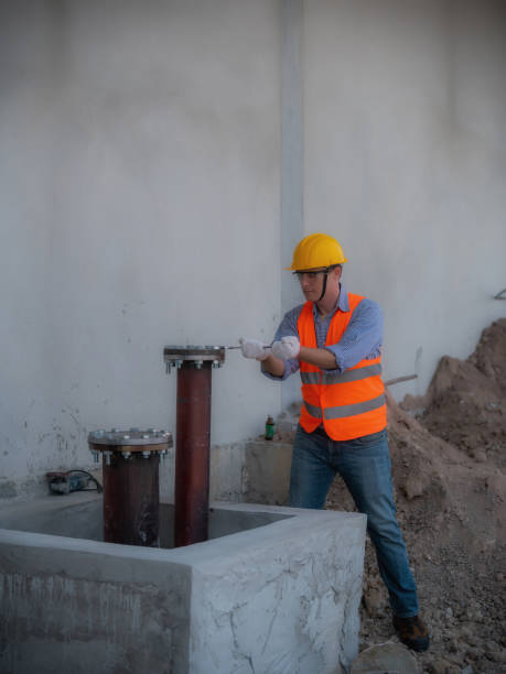 istock Install fire sprinkler system. In the industrial plant, pipe assembly, red fire pipe, fire protection contractors Using Scissor Lift High work 1471670233