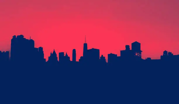 New York City skyline buildings form silhouette shapes against the background sky in Manhattan with red and blue colors