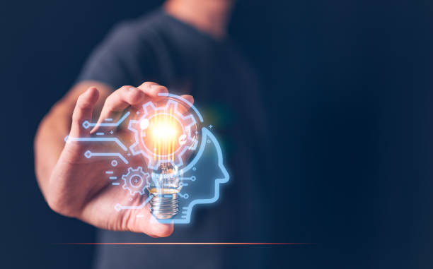 istock idea creative innovation concept, man holding light bulb with icon show new ideas concept. 1471674521