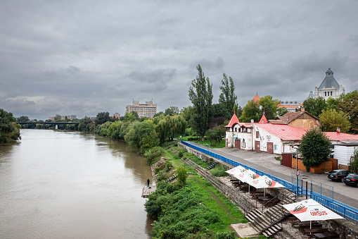 Picture of the waterfront of Arad, Romania, with the Mures river. Arad is the capital city of Arad County, at the edge of Crișana and the Banat. It is the third largest city in Western Romania