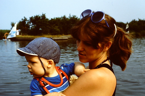 Young mother with her baby boy in the 1970's