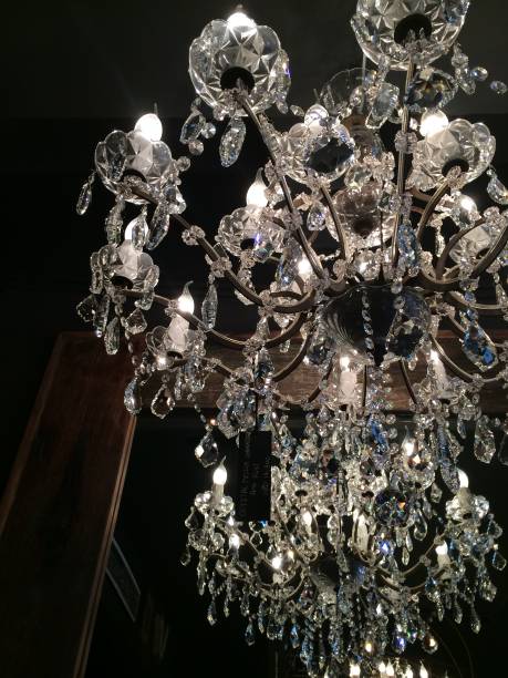 istock Big White Crystal Chandelier in the Dark 1471677186