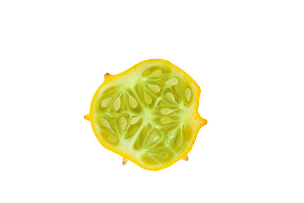 istock Kiwano or horned melon cut in half isolated on white background. 1471677218