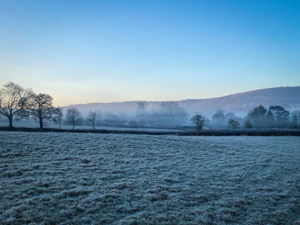 Blue skies over frosty fields in the Severn Vale near Dursley, Gloucestershire, UK. A mobile phone photo with some phone or tablet post processing.