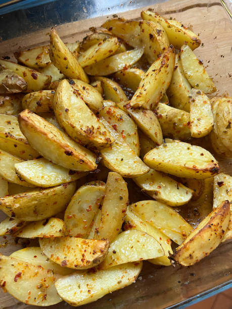 istock Rustic fried potatoes with spices in a transparent bowl 1471679686