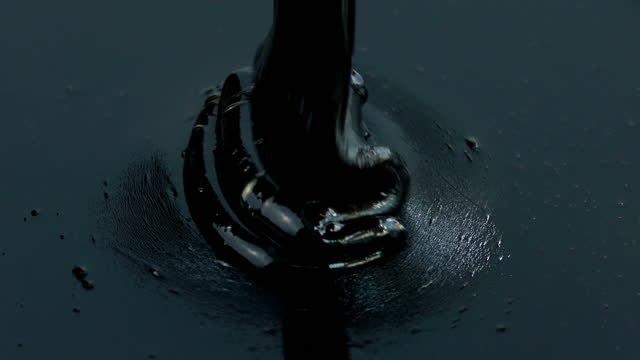 Crude Oil Is Poured Closeup