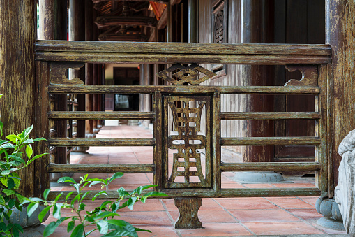 Detail of old Chinese Buddhist temple in city Danang, Vietnam, close up