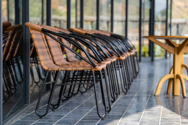 istock Empty chairs and table in street cafe , Vietnam, closeup 1471684199
