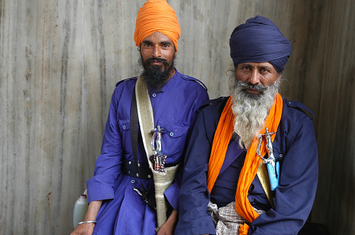 Pushkar, Rajasthan, India - March 14, 2006: Portrait of two men from the Sikh religious sect in the streets of Pushkar village