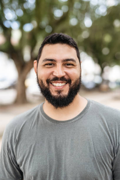 istock Smiling latin american man 1471688690