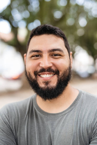istock Smiling latin american man 1471688698