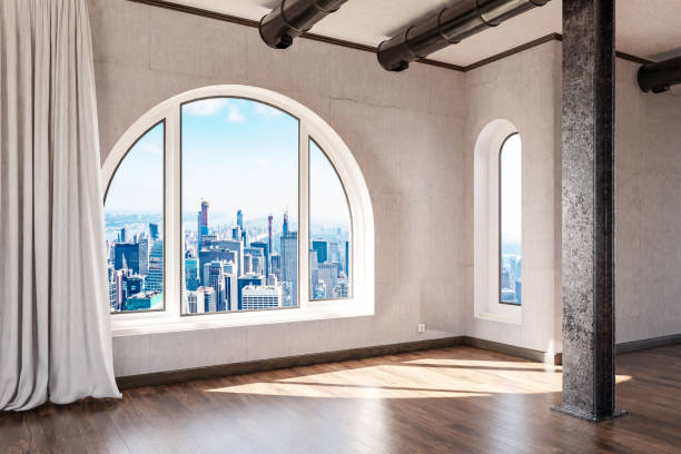 istock empty luxurious loft apartment with arched window and panoramic view over urban downtown; noble interior design mock up with white curtain and wooden floor; 3D Illustration 1471697066