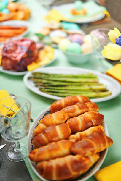 istock Easter Lunch with Roast Pork, Vegetables, Easter Cookies and Easter Cake 1471698826
