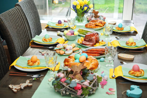 istock Easter Lunch with Roast Pork, Vegetables, Easter Cookies and Easter Cake 1471698835