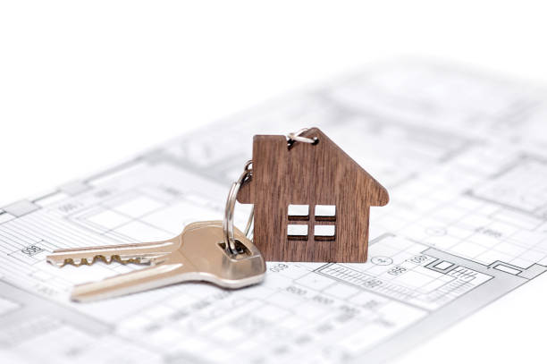 istock A key on a house key ring sits on top of a blueprint 1471699991