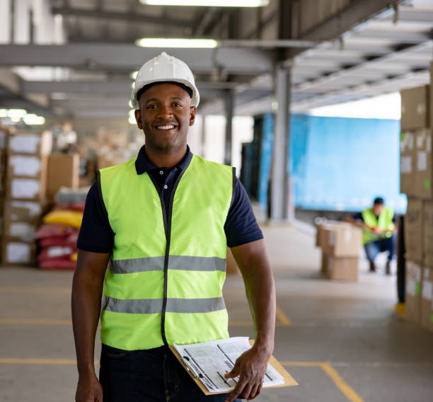 istock Portrait of a happy worker working at a loading dock 1471700217