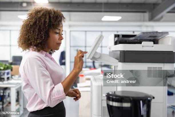 Business Woman Working At The Office And Copying A Document Stock Photo - Download Image Now