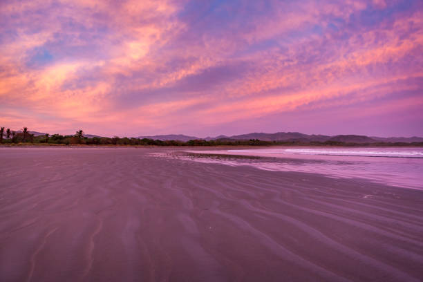 wild buena vista beach at sunset near samara village, costa rica.