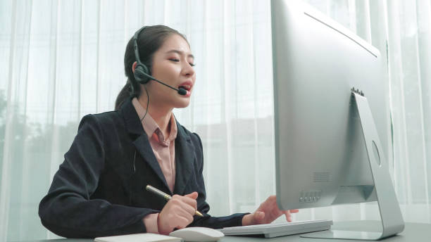 Enthusiastic female operator provide helpful customer service to customer.