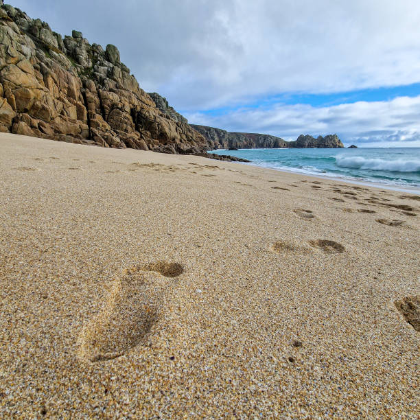 istock Sunny day in Porthcurno beach Cornwall, England February 2023. 1471703473