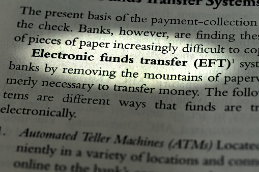 EFT Electronic Funds transfer highlighted and written in business law textbook