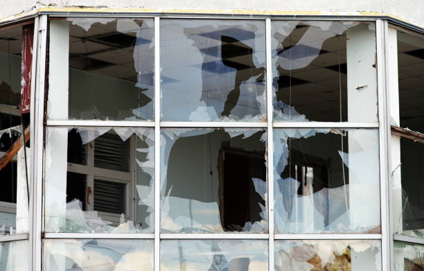 istock Window of the house with broken glass. 1471708506