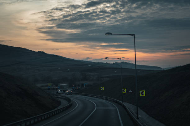 istock sunrise on the highway 1471711448
