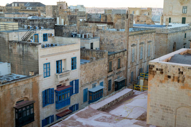 St Paul Street in Valetta, Malta Traditional blue balconies in Malta, view from above st paul cathedral la valletta malta island stock pictures, royalty-free photos & images