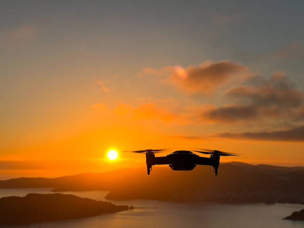 istock Drone filming the sea and mountains at sunset 1471718739