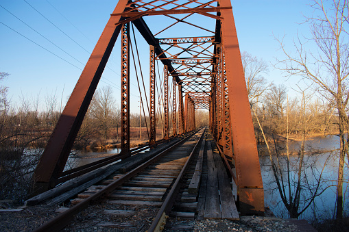 Railroad truss bridge over the Raritan river at Flemington, New Jersey, on a sunny winter day