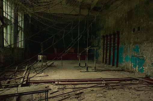 Chernobyl Exclusion Zone, Gym in abandoned school of soviet ghost town Chernobyl-2 near Duga radar complex, post apocalyptic city, Ukraine - Julia 4 2021